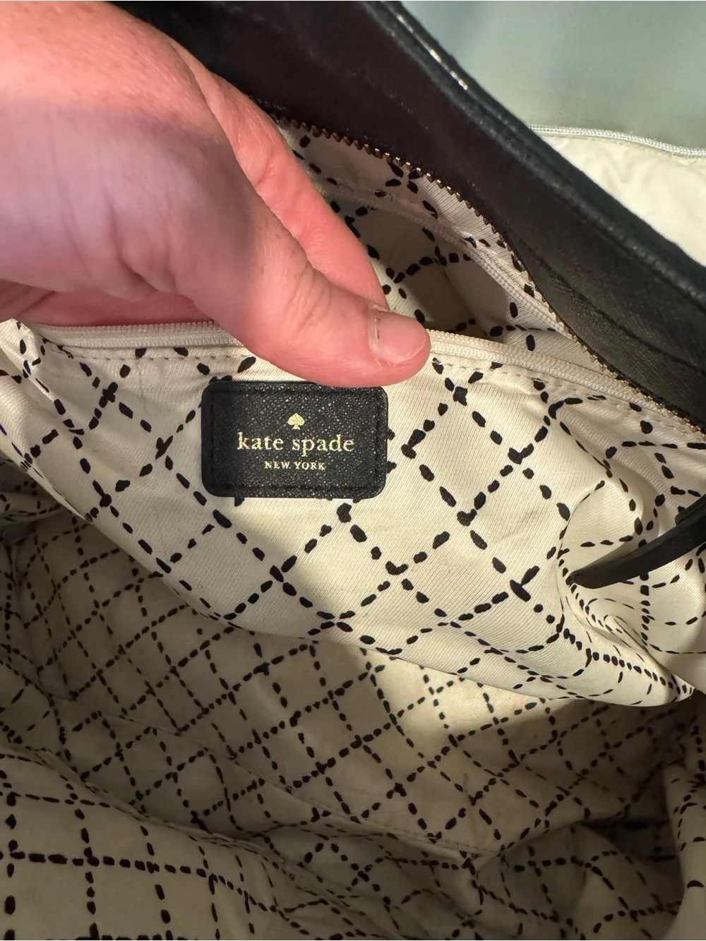 kate spade black leather tote with gold plaque